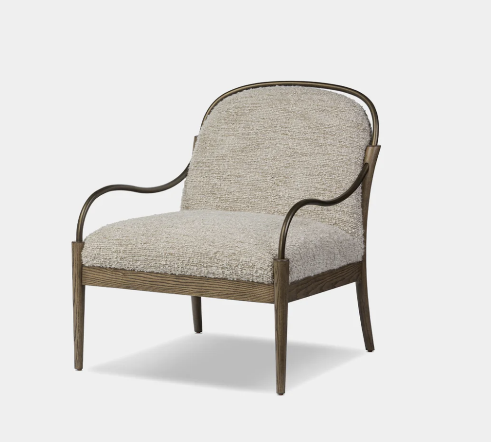 Bouclé armchair, photographed on white.
