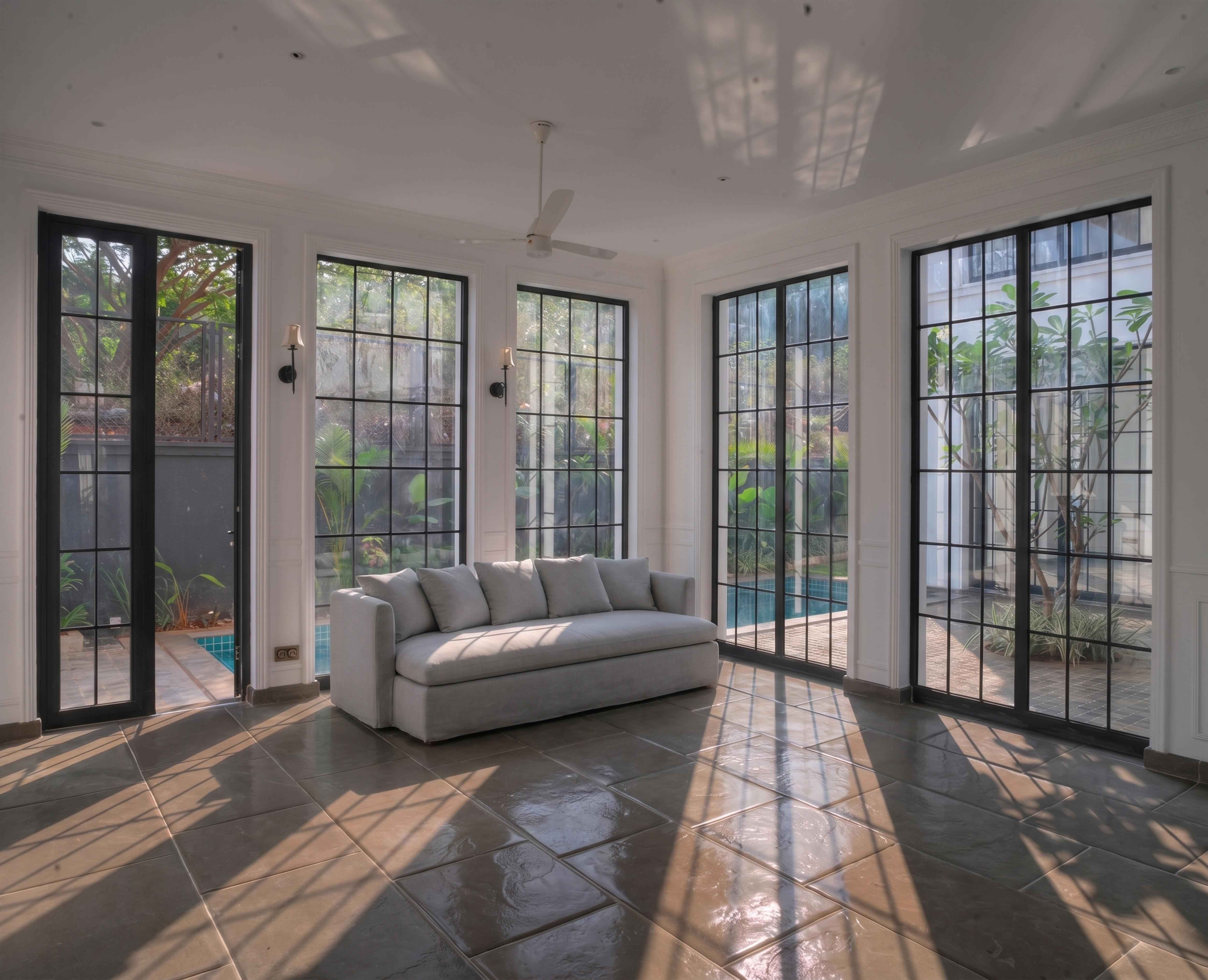 Garden room with a daybed in the centre.