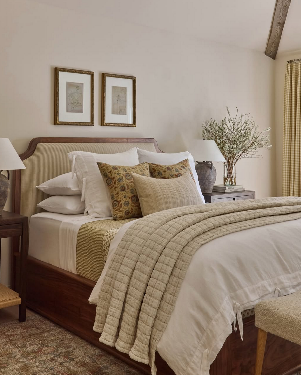 Reference interior: a warm, layered bedroom.