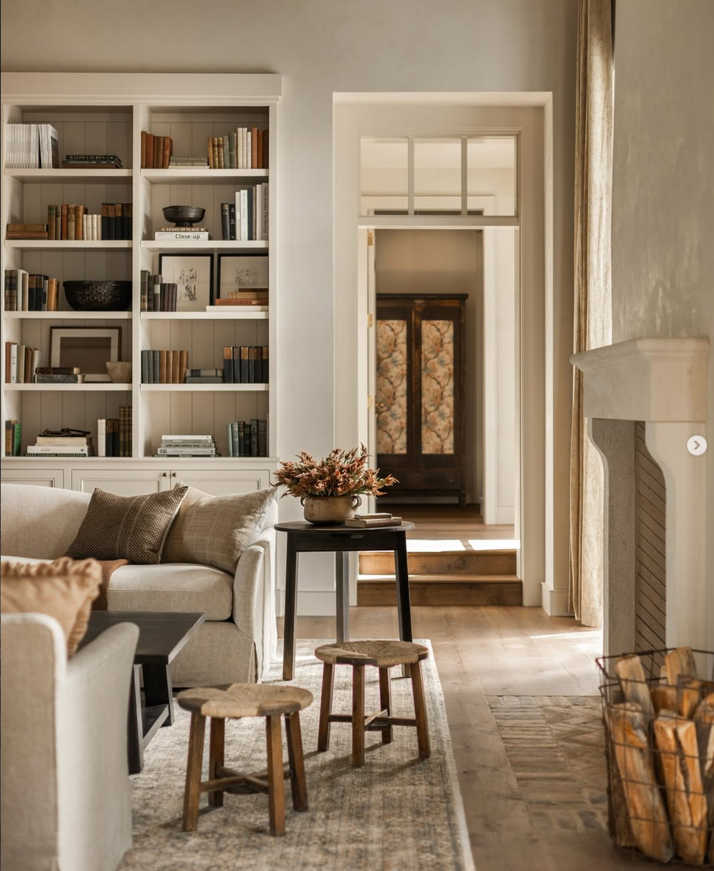 Reference interior: living room with shelving and considered objects.